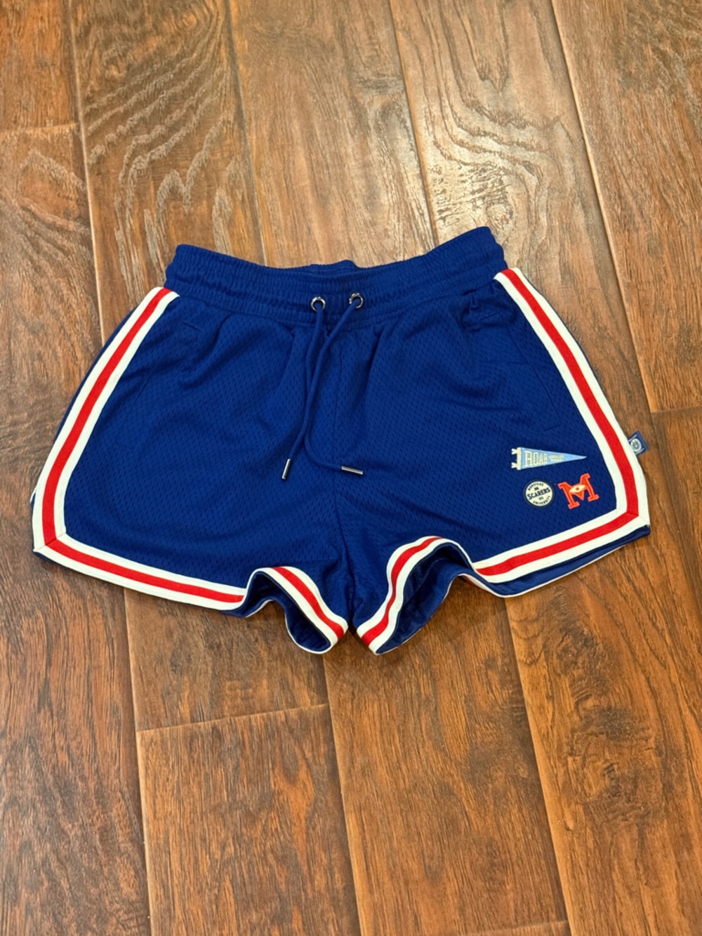 Disney Monsters university gym style shorts
NEVER WORN!